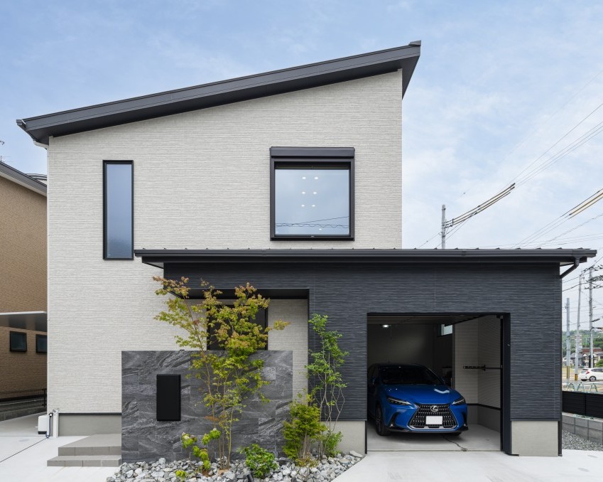 解放感あふれるキッチンと、人が集うリビングのある家